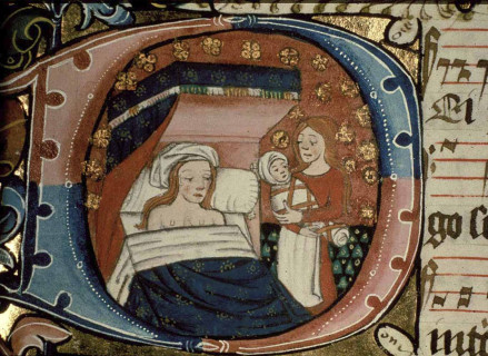 Фото: A midwife presents St Anne, naked except for a white cap, with the baby Mary. Ranworth Antiphoner, fol 257